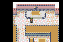 [Image: The interior of Rustboro Gym, with Roxanne missing from her pedestal.]