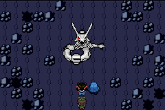 [Image: Roxanne, Nosepass and the protagonist facing a stark white creature resembling a white Rayquaza with black markings.]
